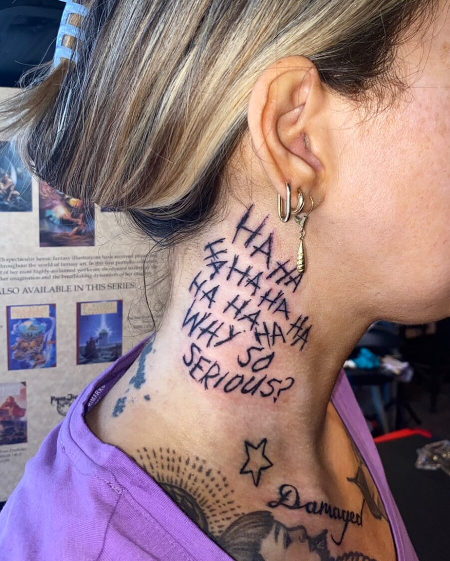 Playful and Dark Joker-Inspired Neck Tattoo Tattoo on skin