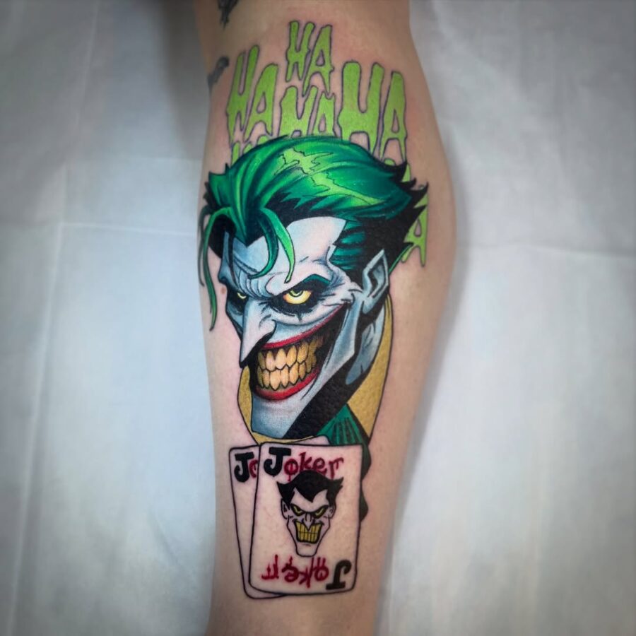 Vibrant Joker Tattoo with Ha-Ha Art Tattoo on skin