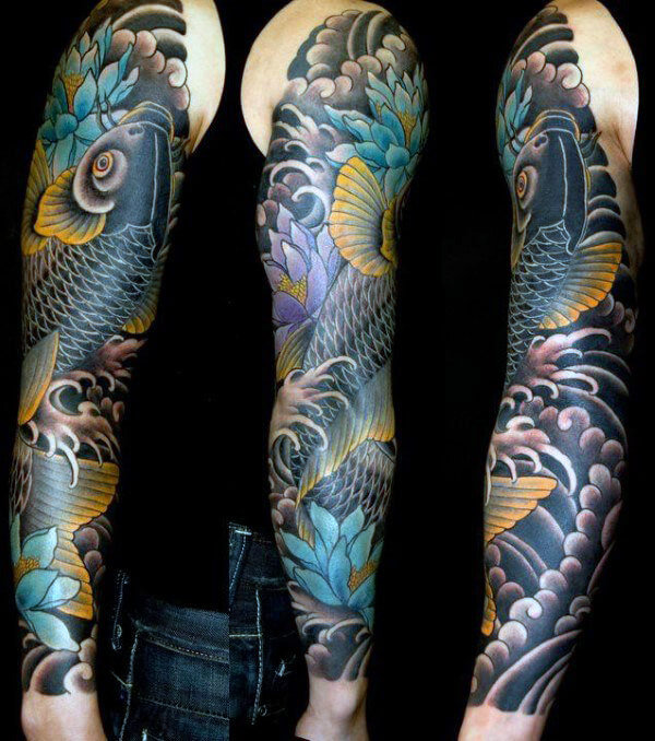 Black Koi Swimming Upstream with Blue Lotus Fish Tattoo Designs Tattoo on skin