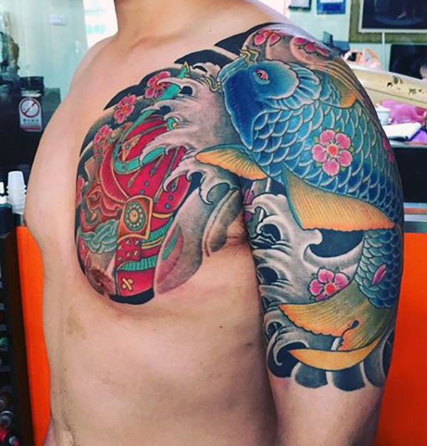 Blue Koi and Samurai Helmet Fish Tattoos Tattoo on skin