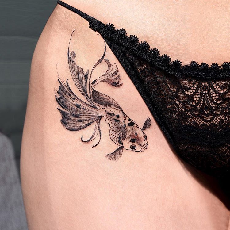 Oranda Goldfish in Ink Painting Style Tattoo on skin
