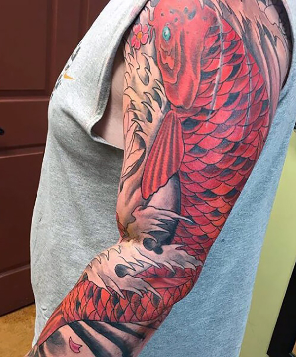 Red Koi Swimming Up the Stream Fish Tattoos Tattoo on skin