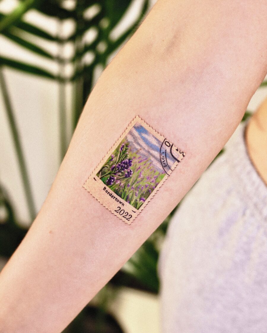 Charming lavender postage stamp tattoo design Tattoo on skin