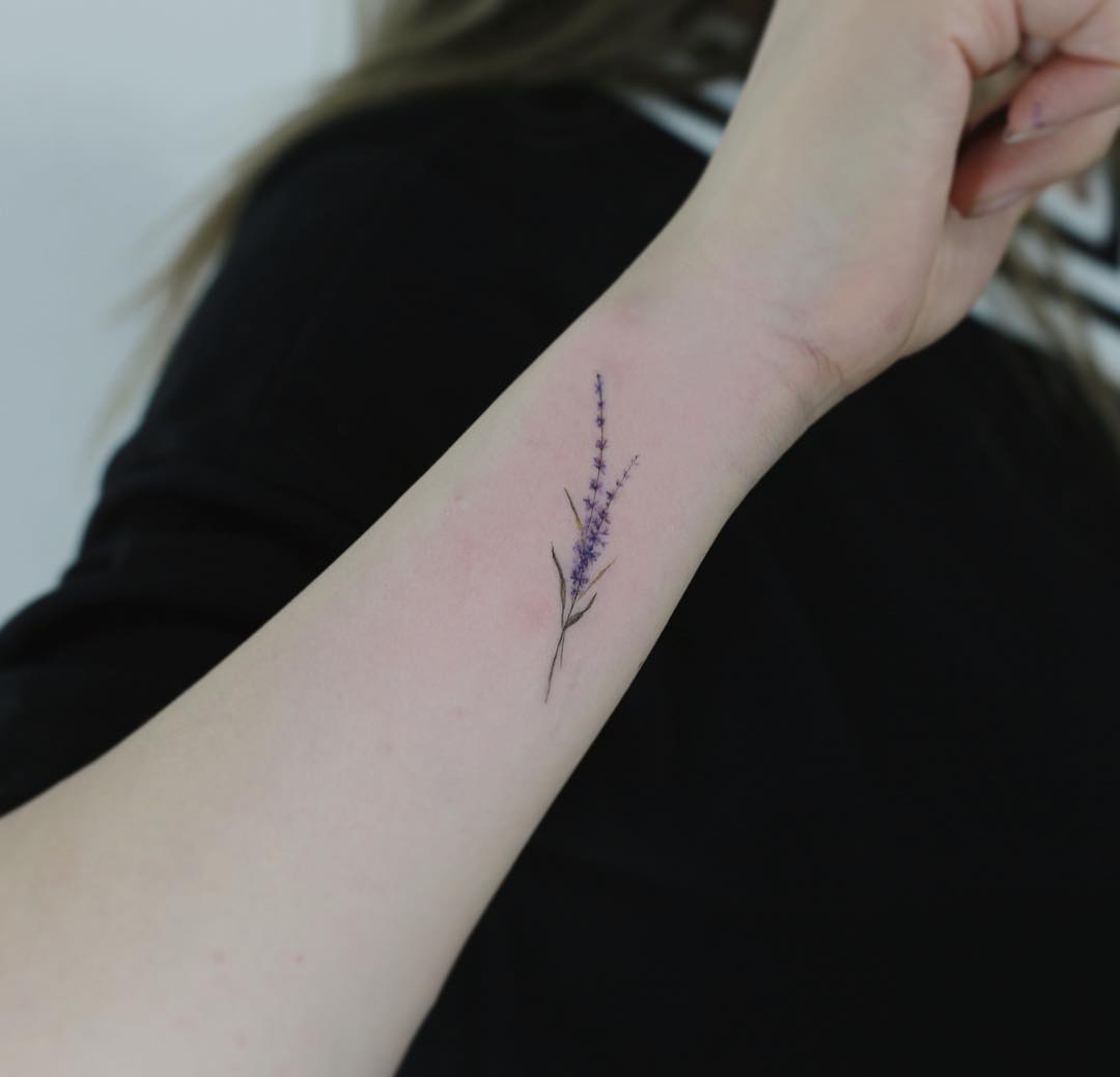 Delicate lavender tattoo on the forearm Tattoo on skin