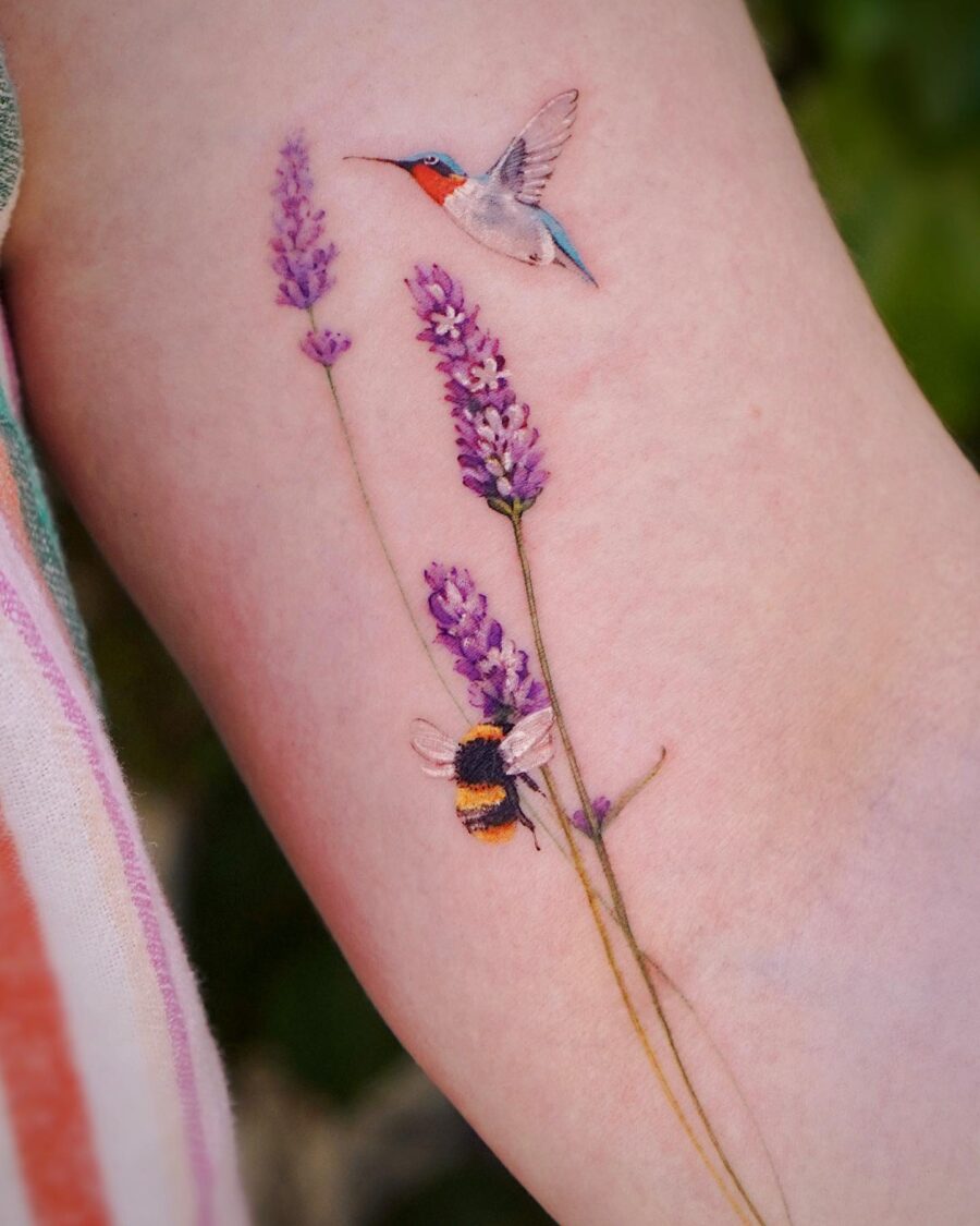 Delicate lavender tattoo with hummingbird and bee Tattoo on skin