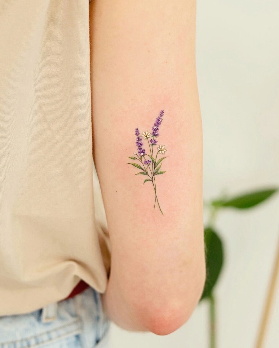 Elegant lavender flower tattoo on the arm Tattoo on skin