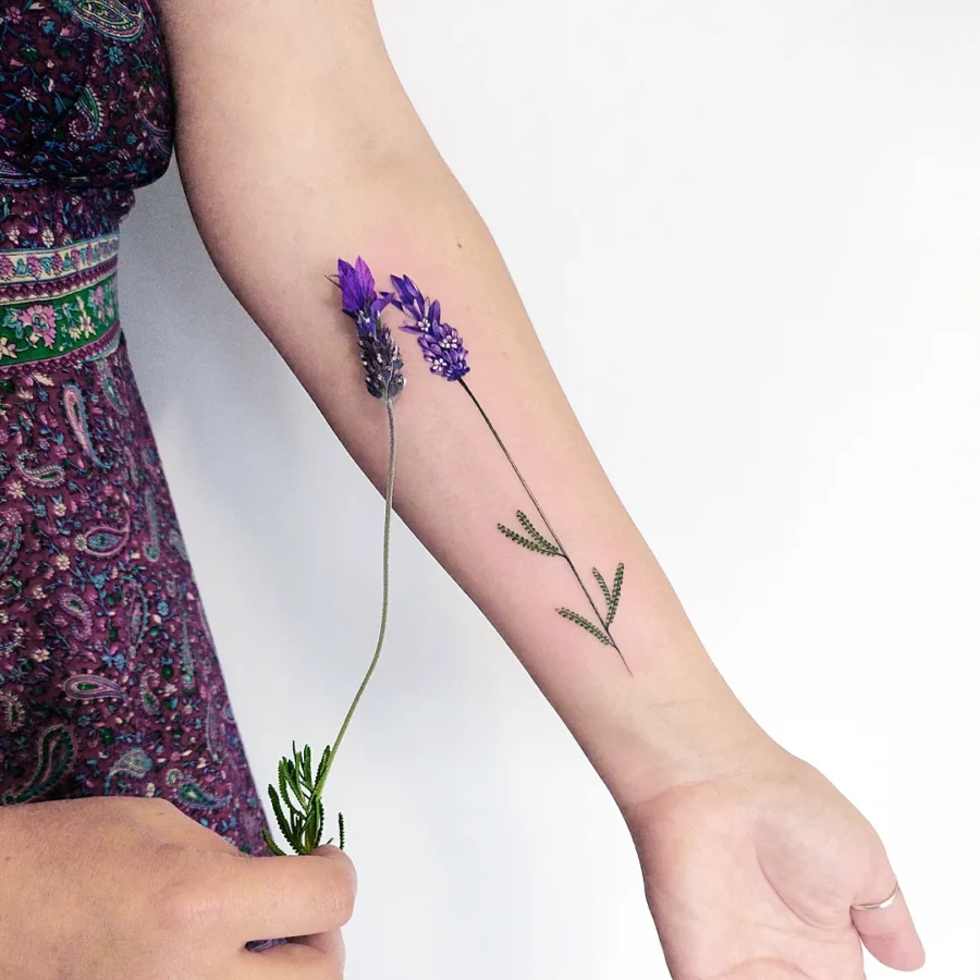 Elegant lavender tattoo design on the arm Tattoo on skin