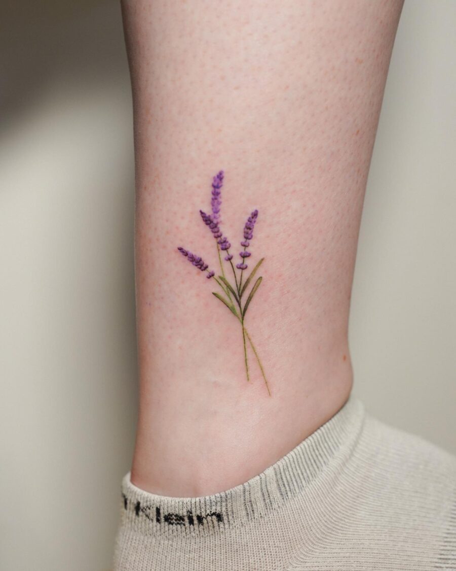 Elegant lavender tattoo on ankle. Tattoo on skin