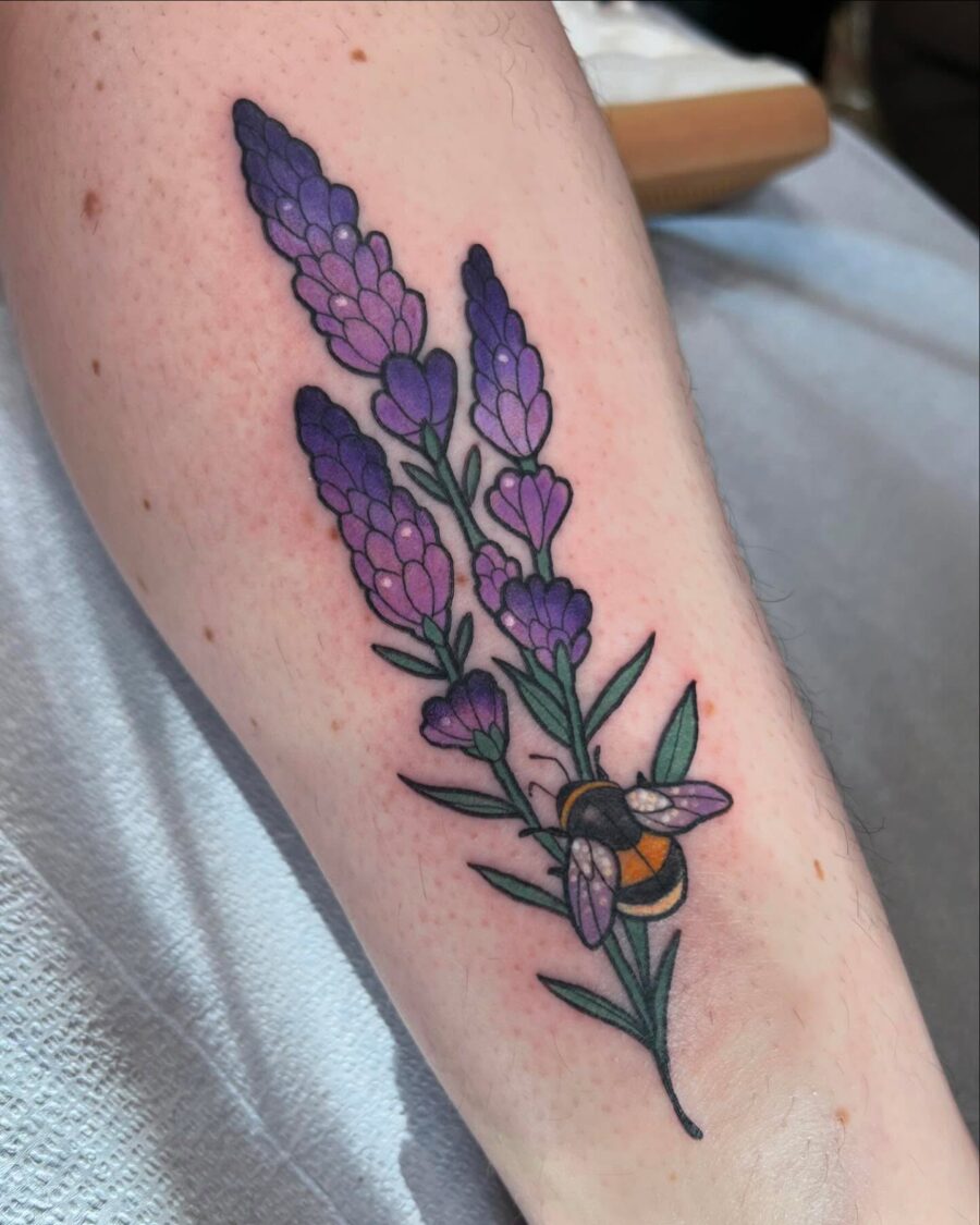 Elegant lavender tattoo with a buzzing bee Tattoo on skin