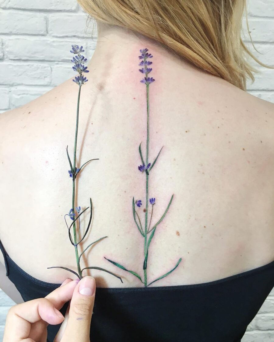 Elegantly showcasing lavender-themed body art Tattoo on skin
