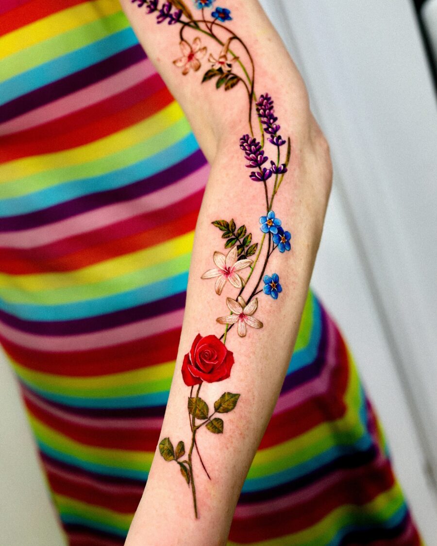Vibrant lavender flowers intertwined with rose tattoo Tattoo on skin