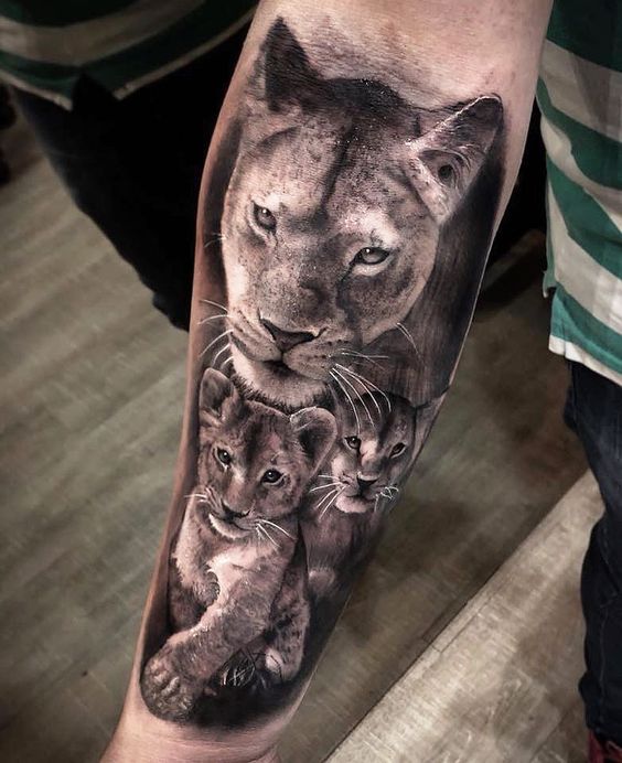 Lion Tattoo Ideas: Realistic Lioness with Two Cubs Tattoo Tattoo on skin