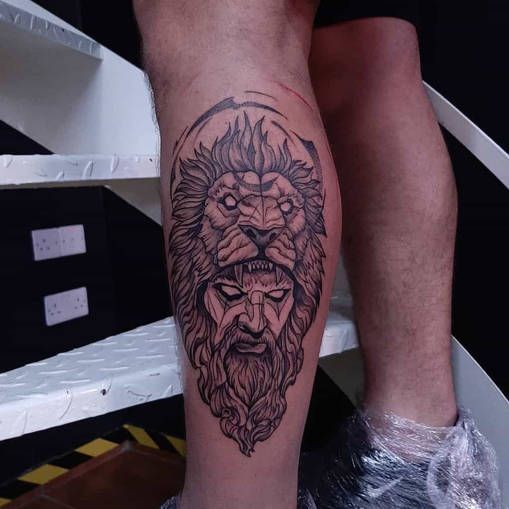 Warrior with Lion Headdress Tattoo on Leg Tattoo on skin