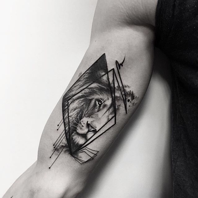 Lion Face Inside Diamond Geometric Lion Tattoo Tattoo on skin