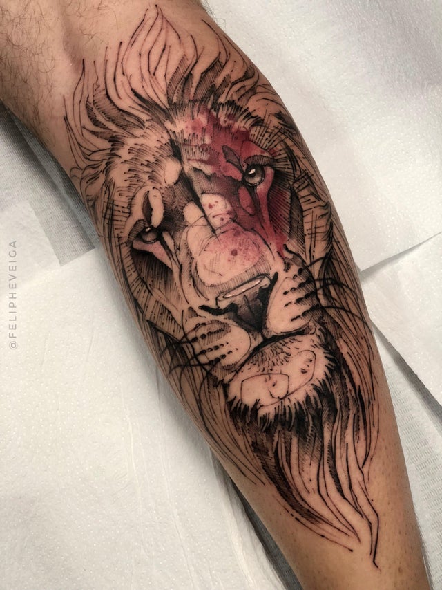 Lion Tattoo Ideas: Large Lion Head Tattoo with Subtle Coloring Tattoo on skin