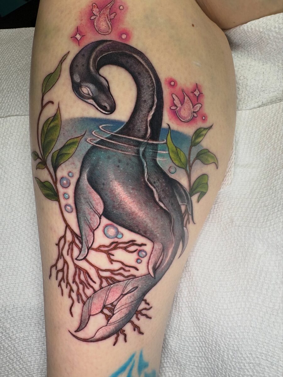 Artistic Representation of the Loch Ness Monster Tattoo Tattoo on skin