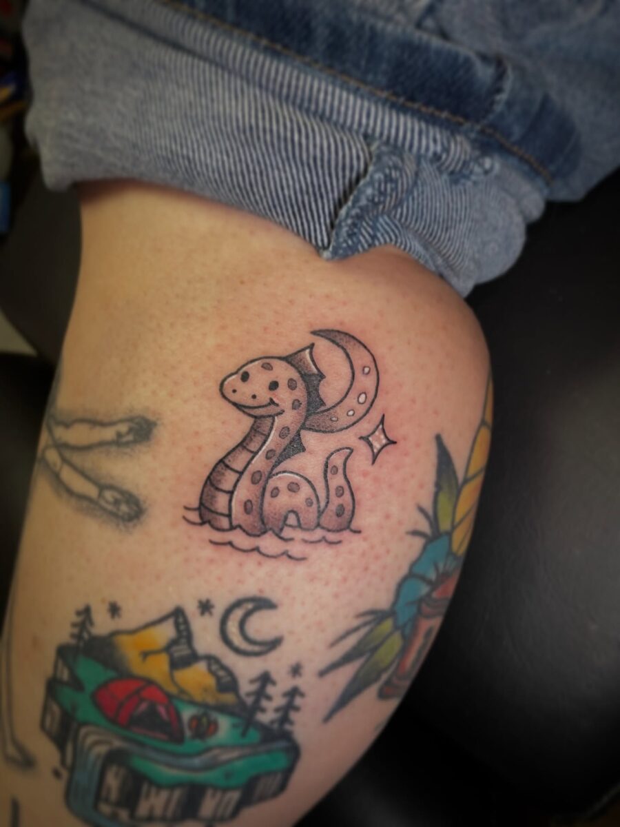 Charming Loch Ness Monster Tattoo Design Tattoo on skin
