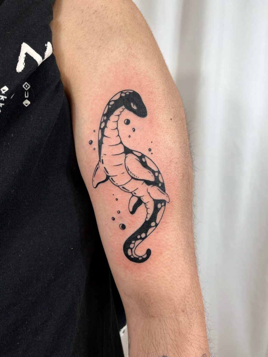 Charming Loch Ness Monster Tattoo Design Tattoo on skin