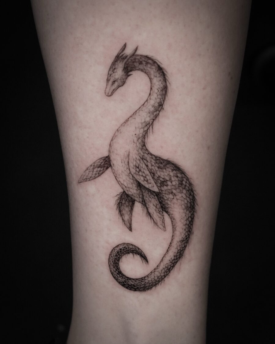 Stunning Loch Ness Monster Tattoo Design Tattoo on skin