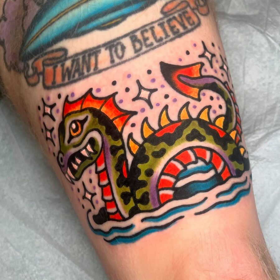 Vibrant Loch Ness Monster Tattoo Design Tattoo on skin