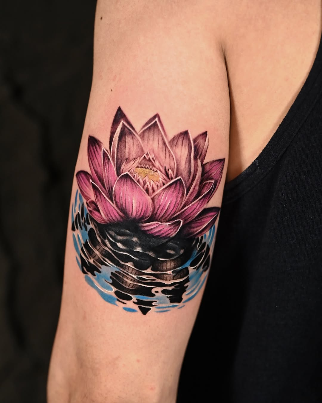 A stunning lotus tattoo bursting with color Tattoo on skin