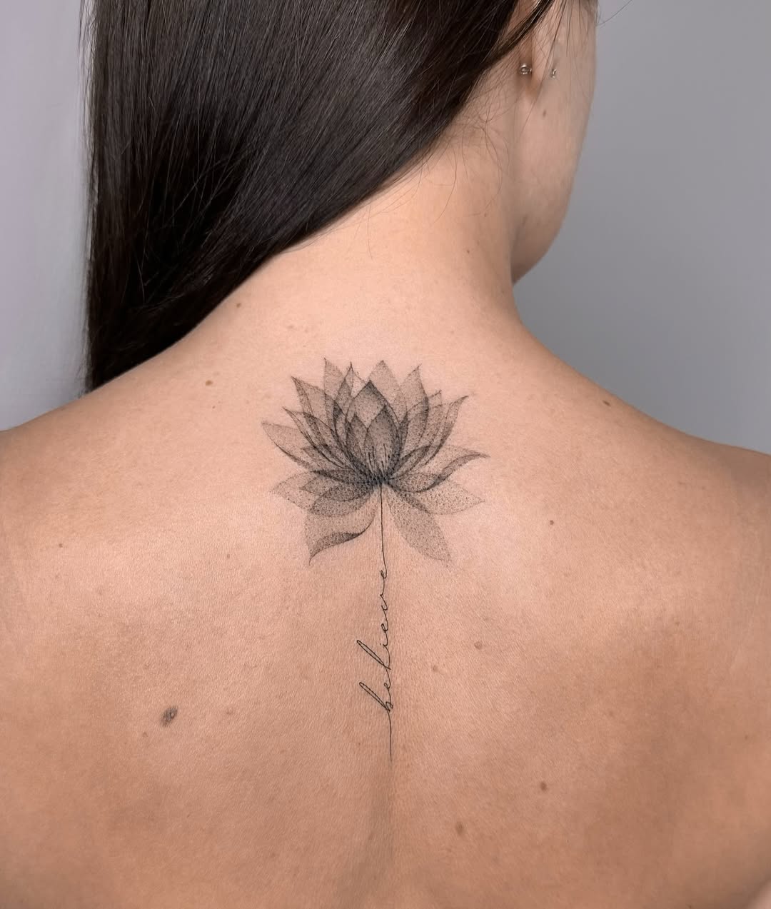 Elegant lotus design with soothing vibes. Tattoo on skin