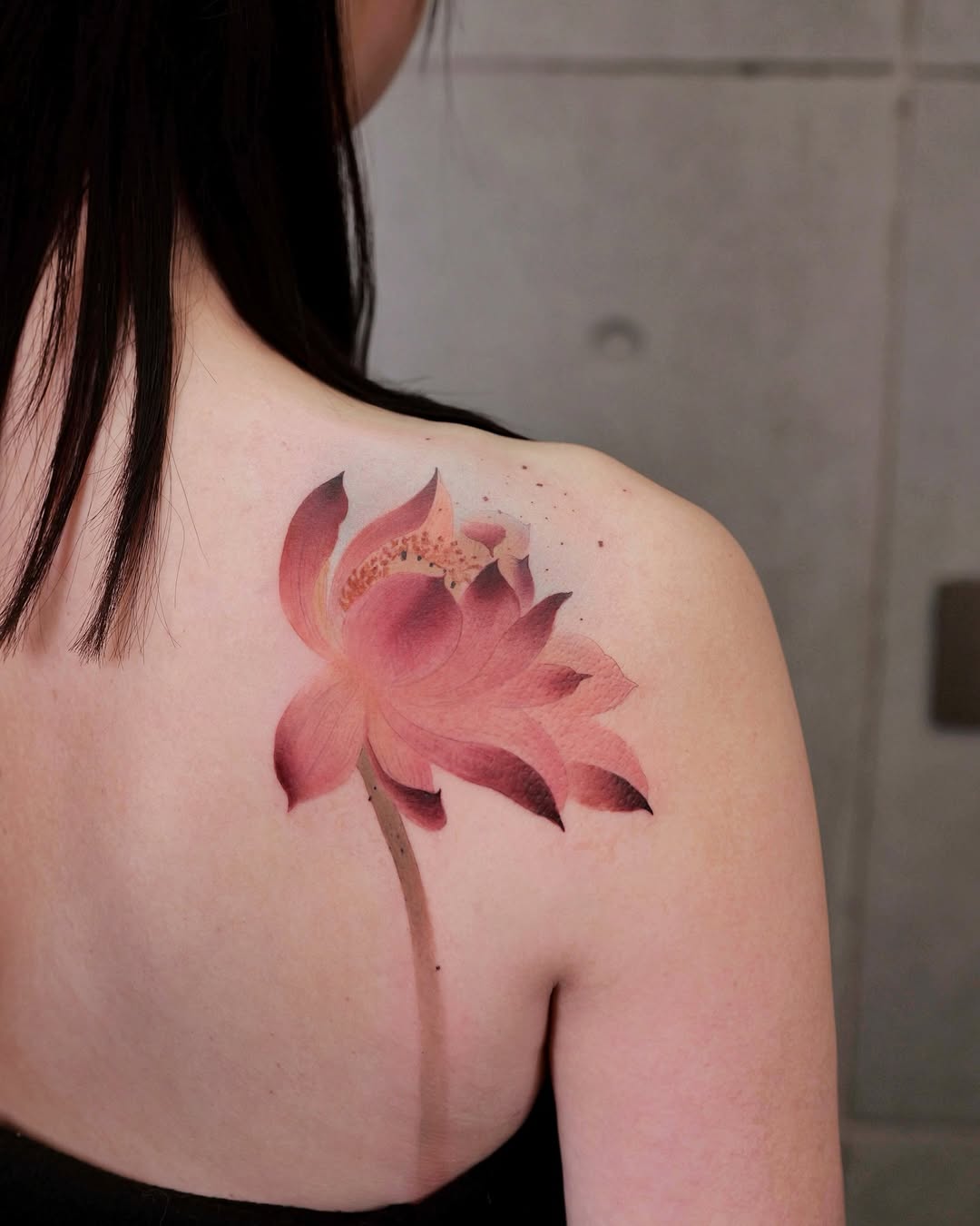 Elegant lotus flower tattoo on shoulder Tattoo on skin