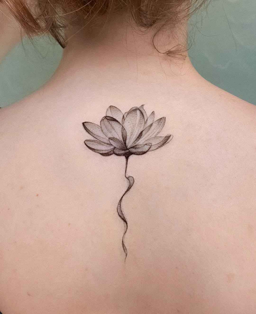 Elegant lotus tattoo with delicate detailing Tattoo on skin