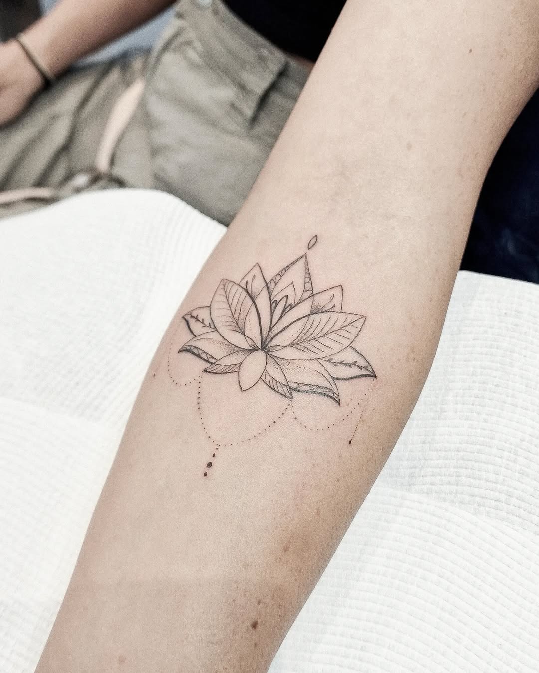 Elegant lotus tattoo with intricate details Tattoo on skin