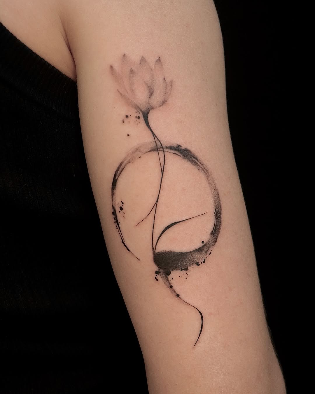 Elegant lotus tattoo with minimalist design Tattoo on skin