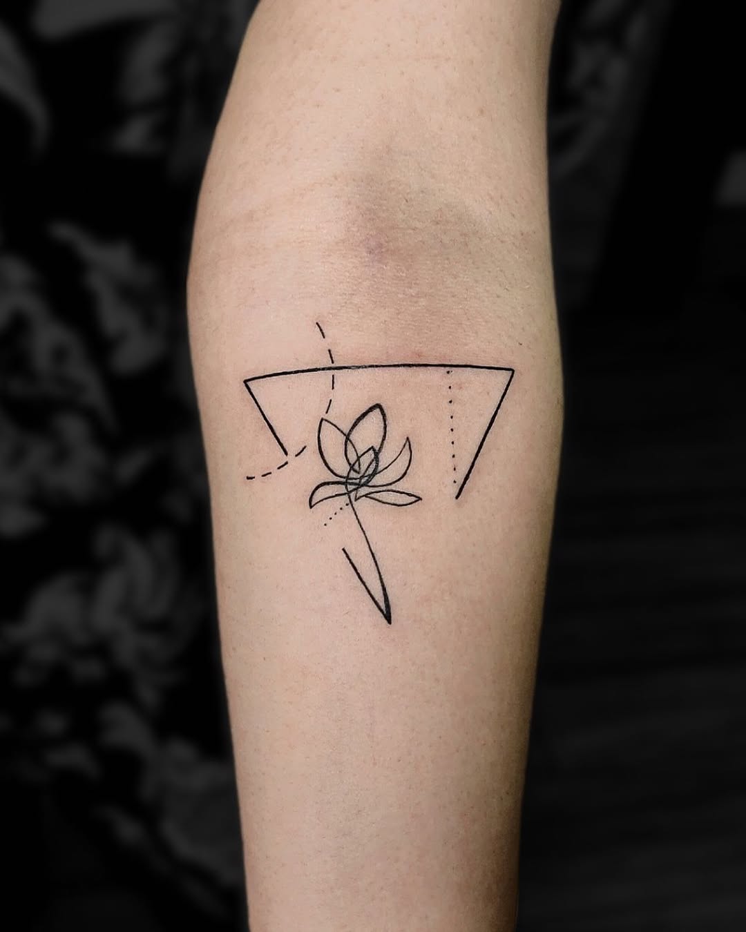 Elegant minimalist lotus tattoo design Tattoo on skin