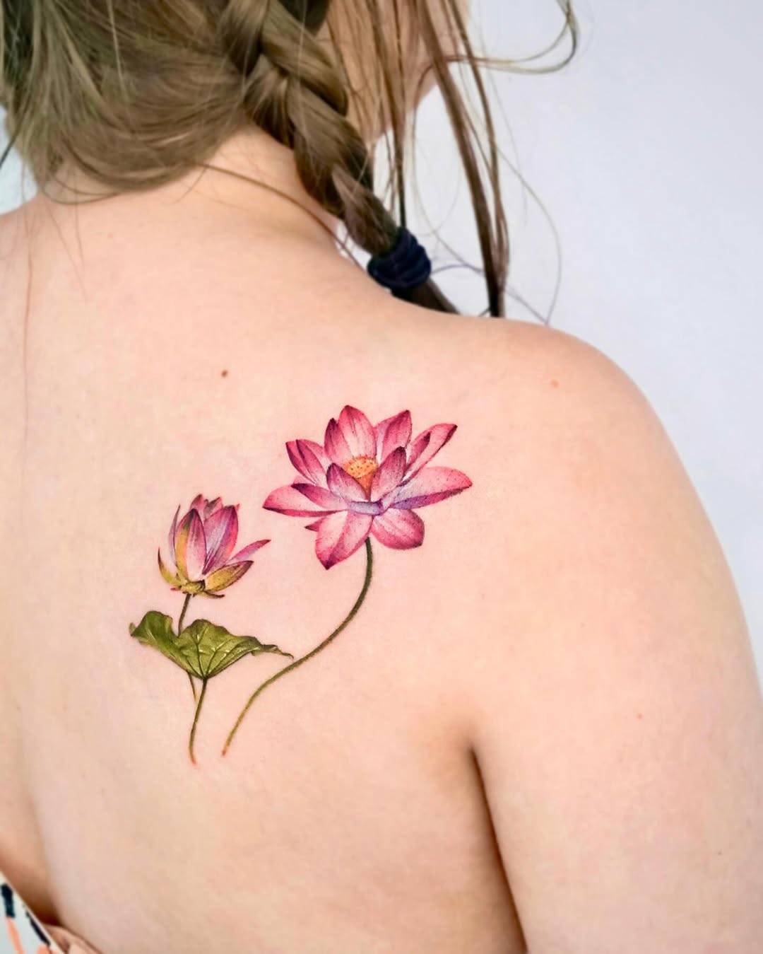 Stunning lotus tattoo showcasing vibrant colors Tattoo on skin