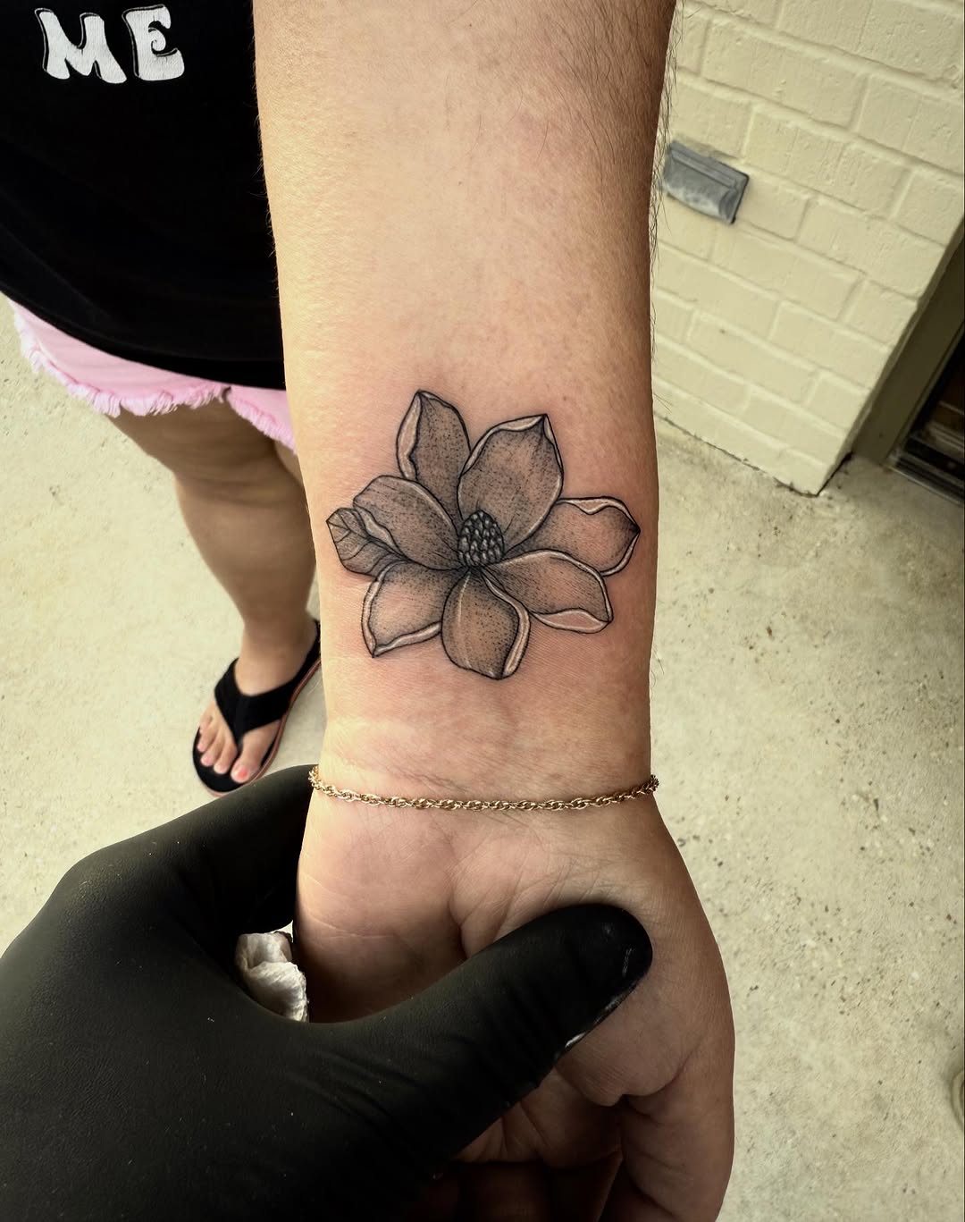 Elegant Magnolia Tattoo on the Wrist Tattoo on skin