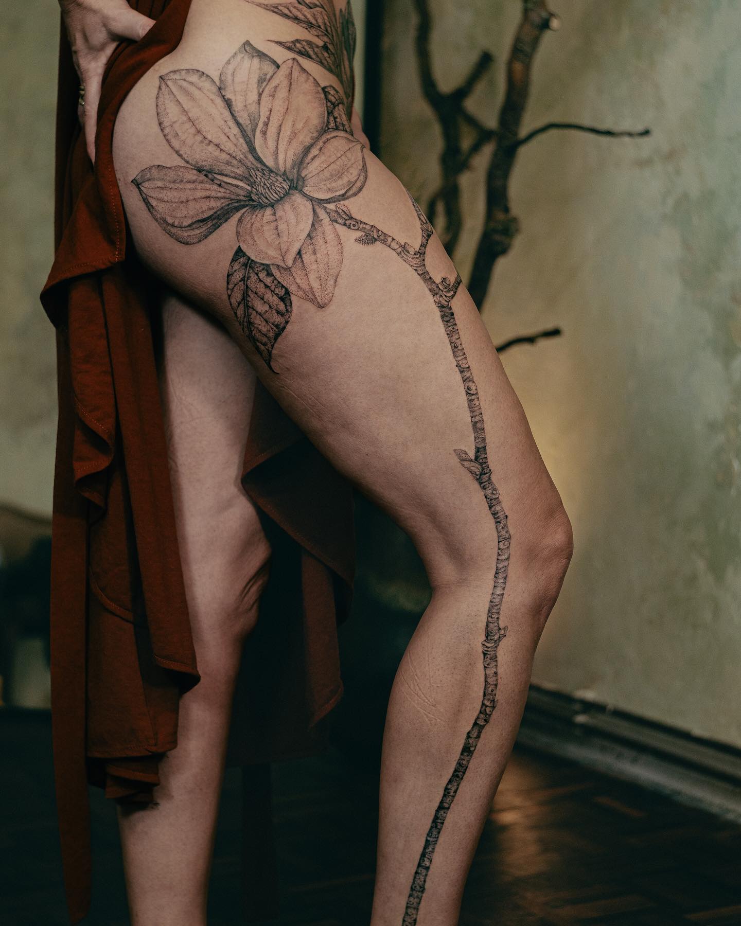 Elegant Magnolia Tattoo on Woman's Leg Tattoo on skin