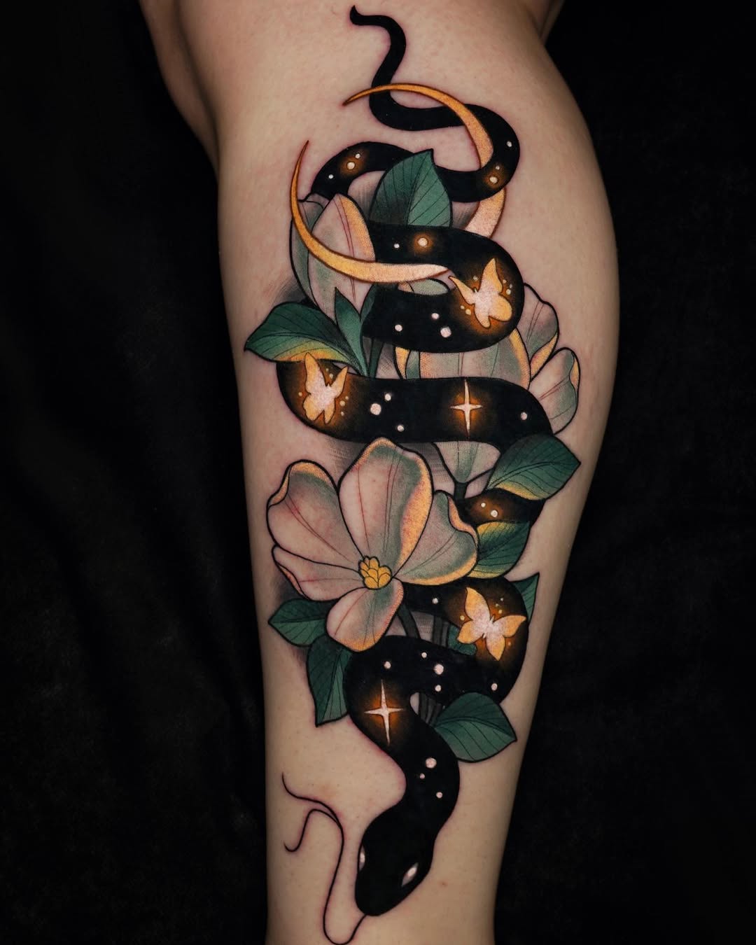 Stunning Magnolia and Snake Tattoo Design Tattoo on skin