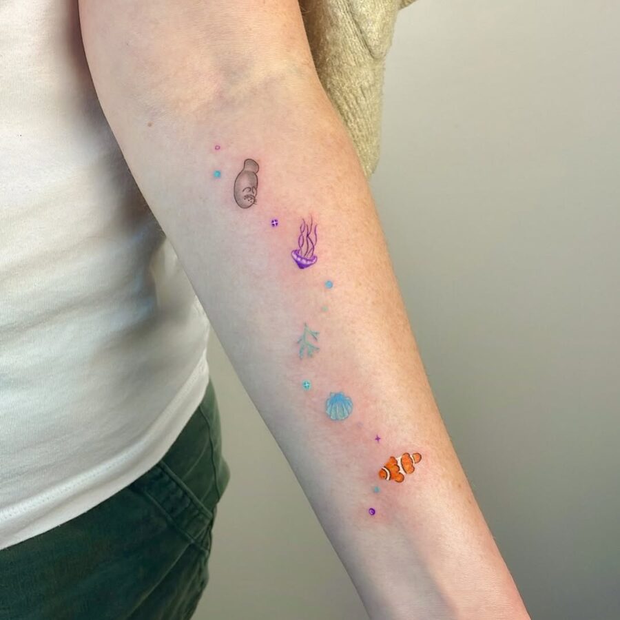 Colorful manatee tattoos with sea life elements manatee tattoos