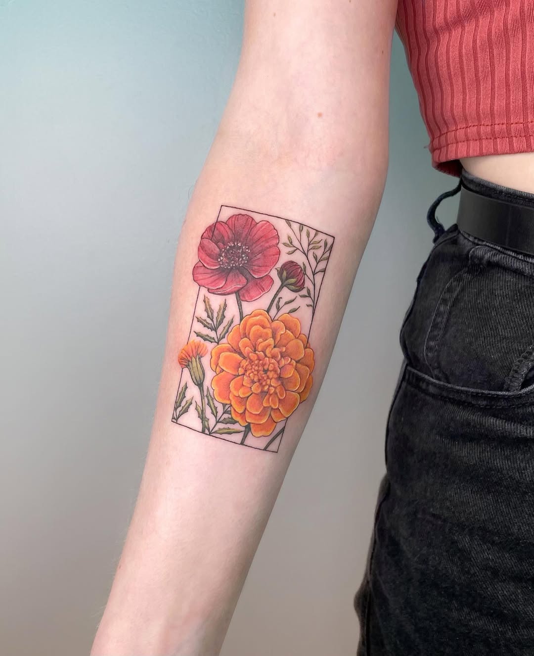 Beautiful marigold and poppy tattoo design Tattoo on skin
