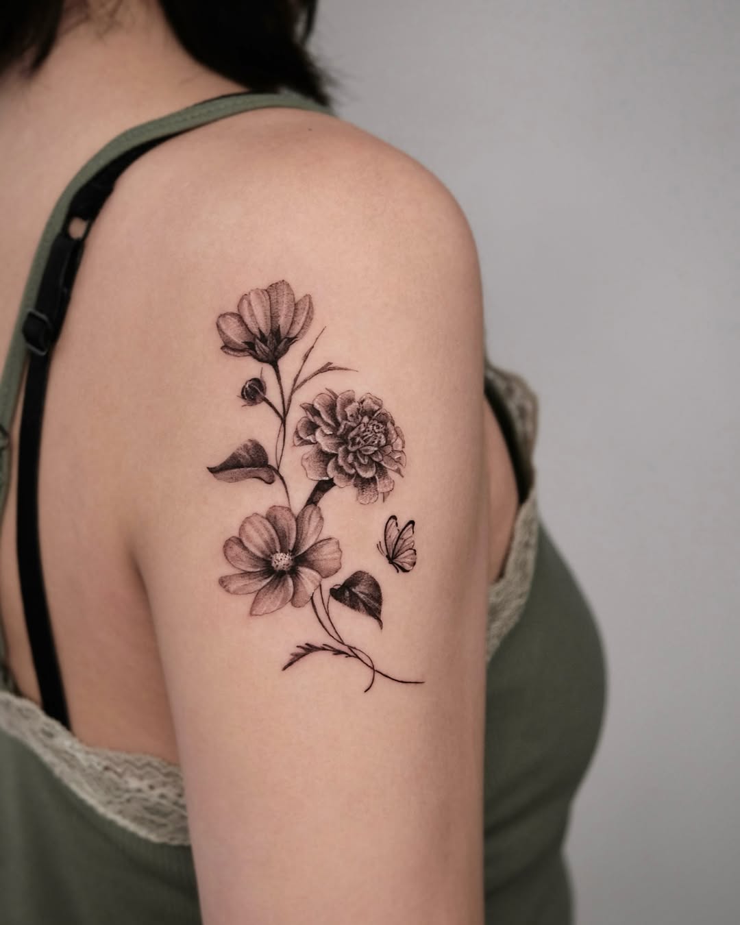 Elegant marigold and flower blend tattoo Tattoo on skin