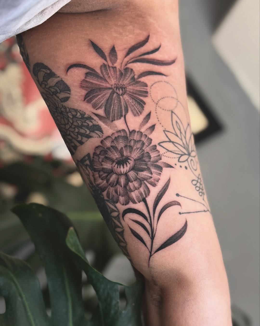 Stunning marigold tattoo with intricate details Tattoo on skin