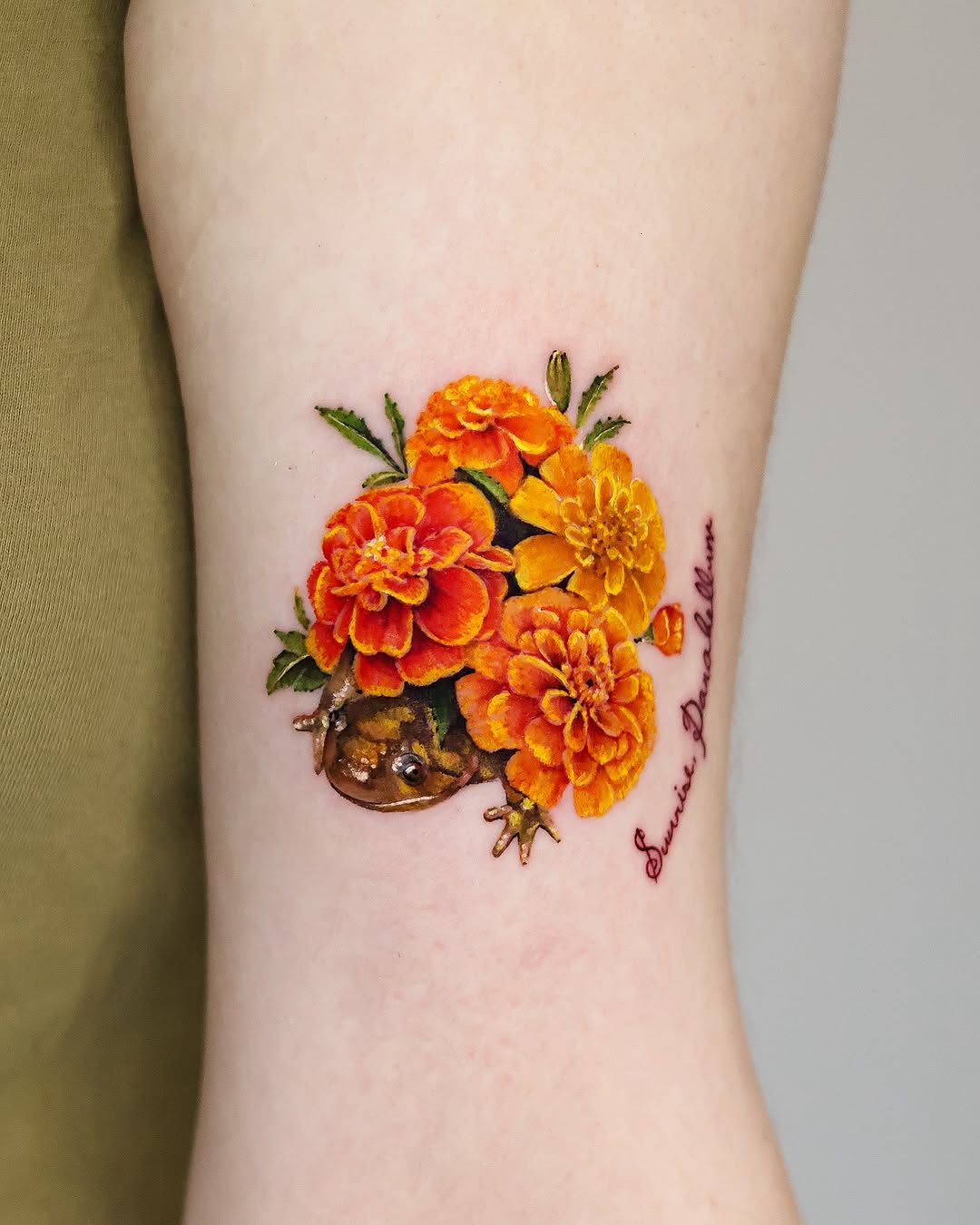 Vibrant marigold tattoo with a unique twist marigold tattoos