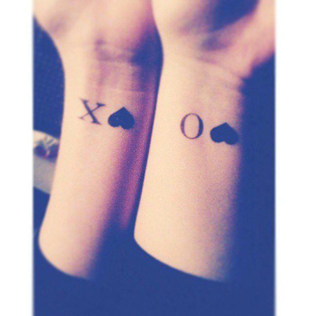 couple tattoos, initial tattoos Tattoo on skin