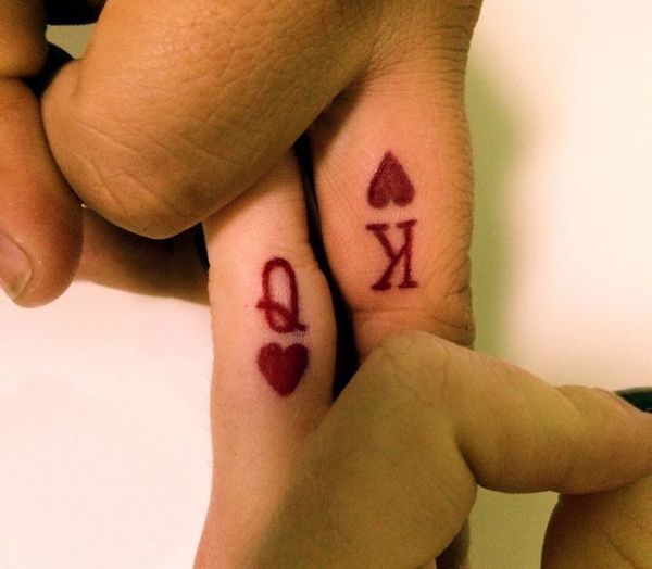 couple tattoos, king and queen, finger tattoos Tattoo on skin