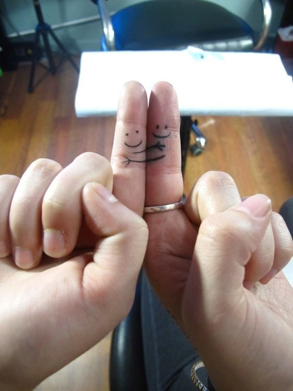 couple tattoos, king and queen tattoos, couple finger tattoos Tattoo on skin
