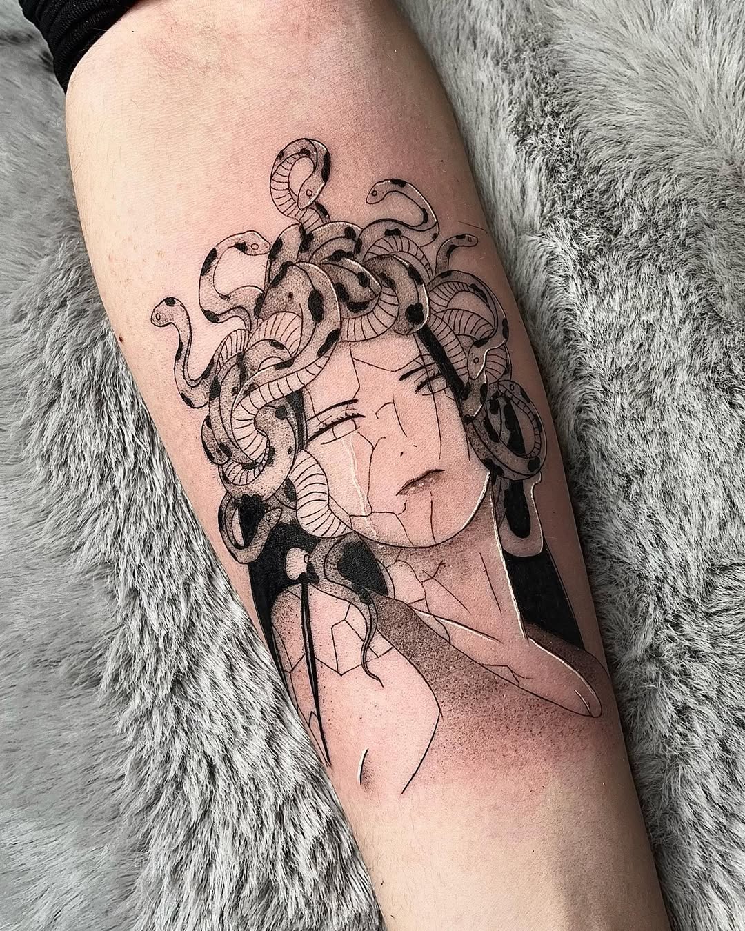 Artistic Medusa tattoo with snake details Tattoo on skin