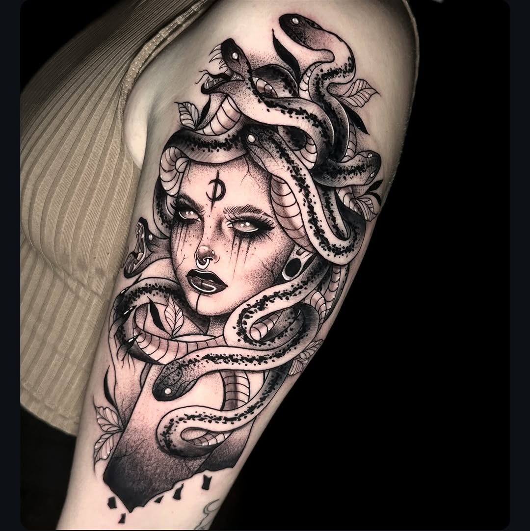 Eerie Medusa Tattoo with Intricate Serpent Details Tattoo on skin