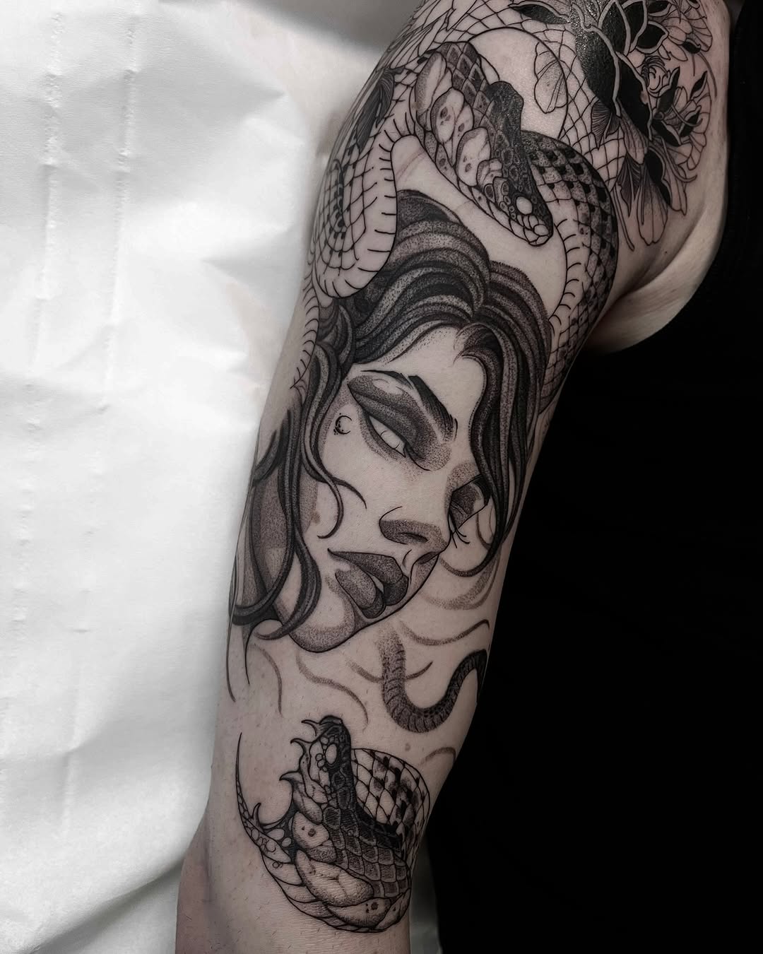 Elegant Medusa Tattoo Featuring Intricate Snake Details Tattoo on skin
