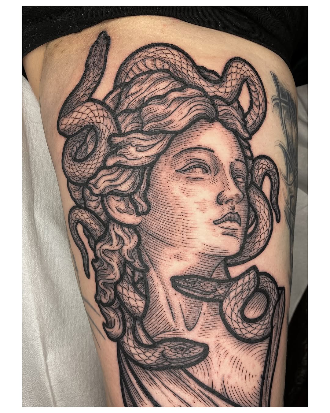 Elegant Medusa Tattoo with Flowing Snakes Tattoo on skin