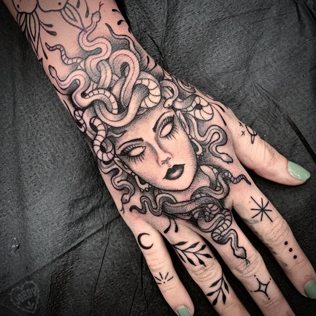 Elegant Medusa Tattoo with Intricate Snake Details Tattoo on skin