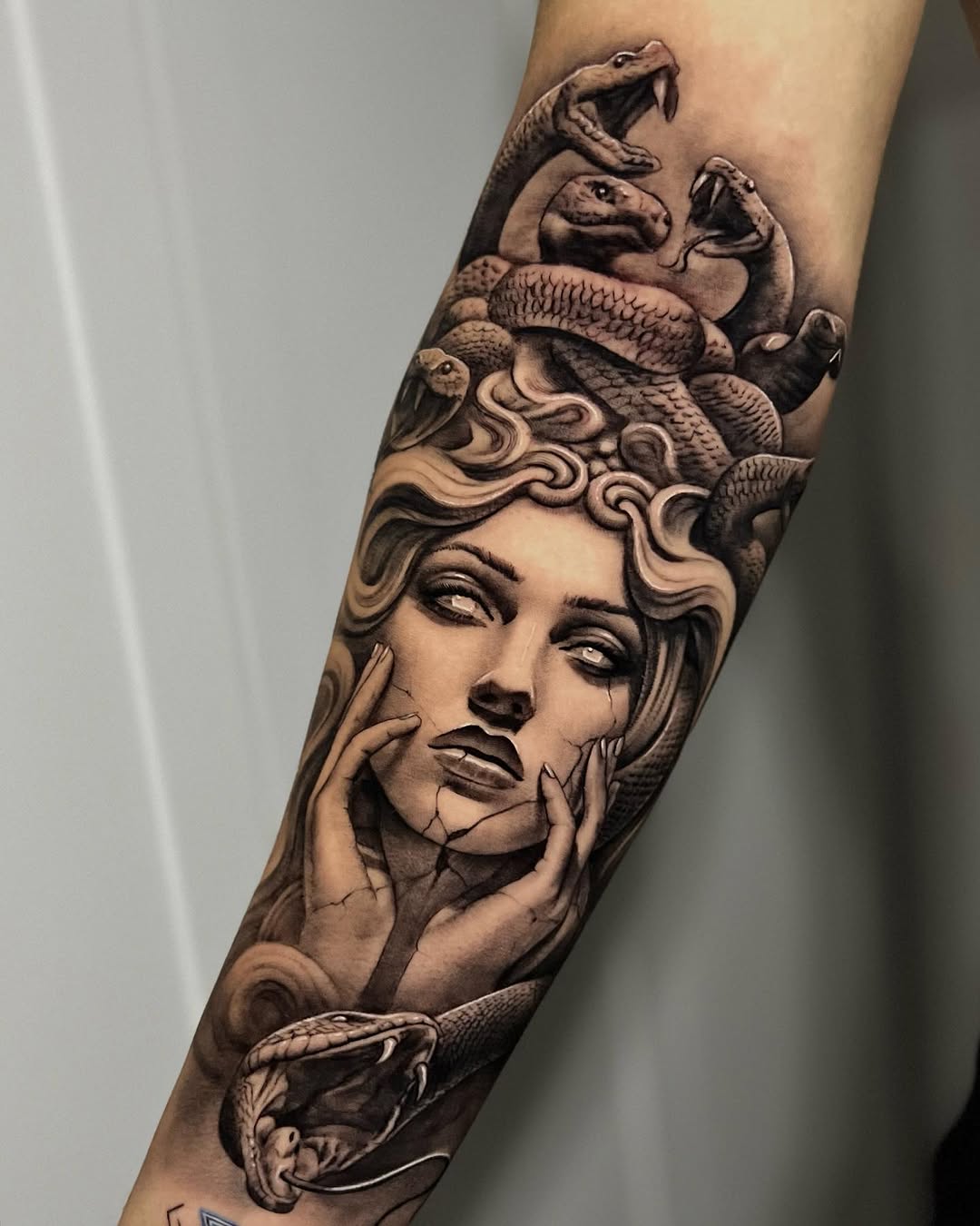 Elegant Medusa tattoo with serpentine details Tattoo on skin