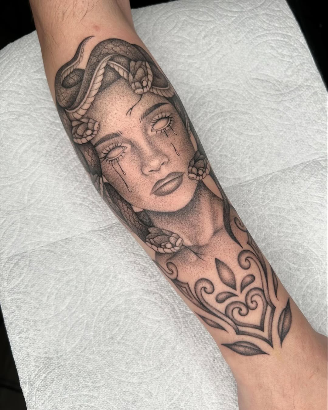 Elegant Medusa Tattoo with Striking Snake Detail Tattoo on skin